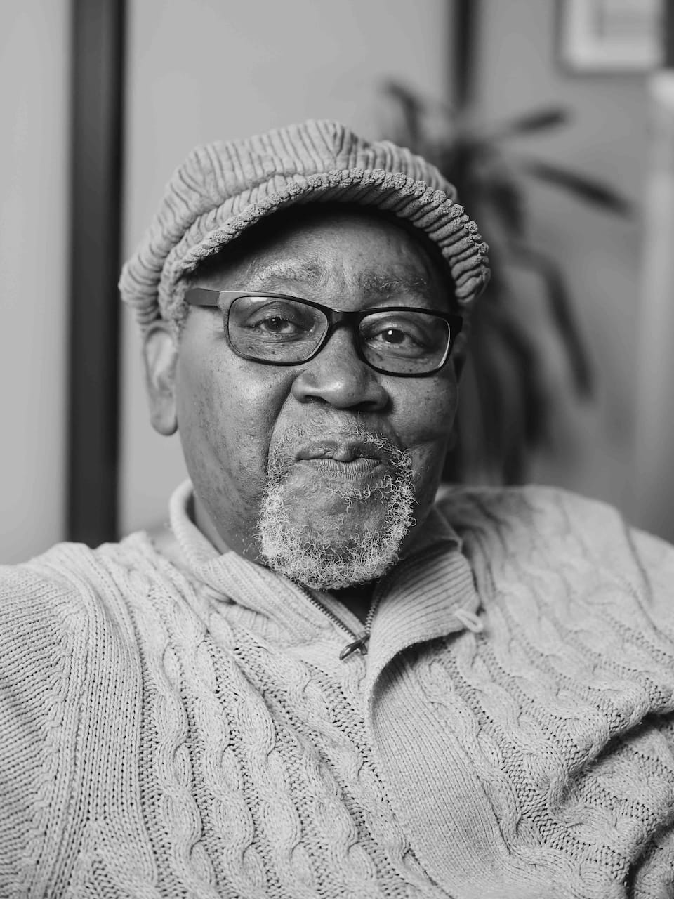 Portrait of older man in black and white.